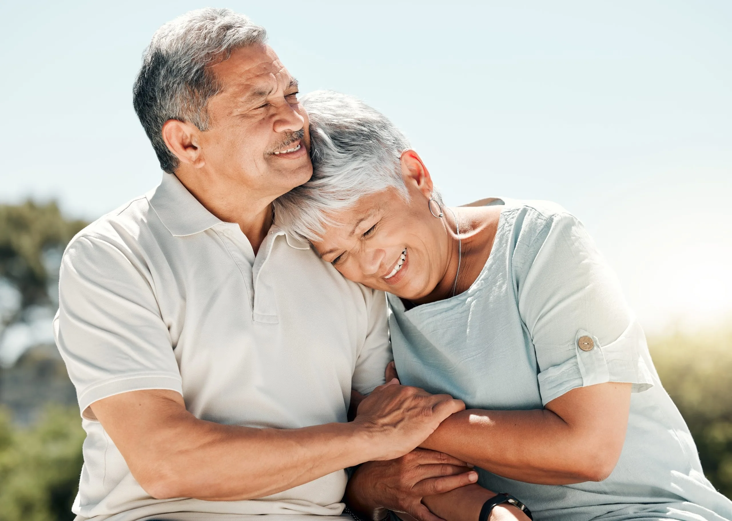 two senior women laughing