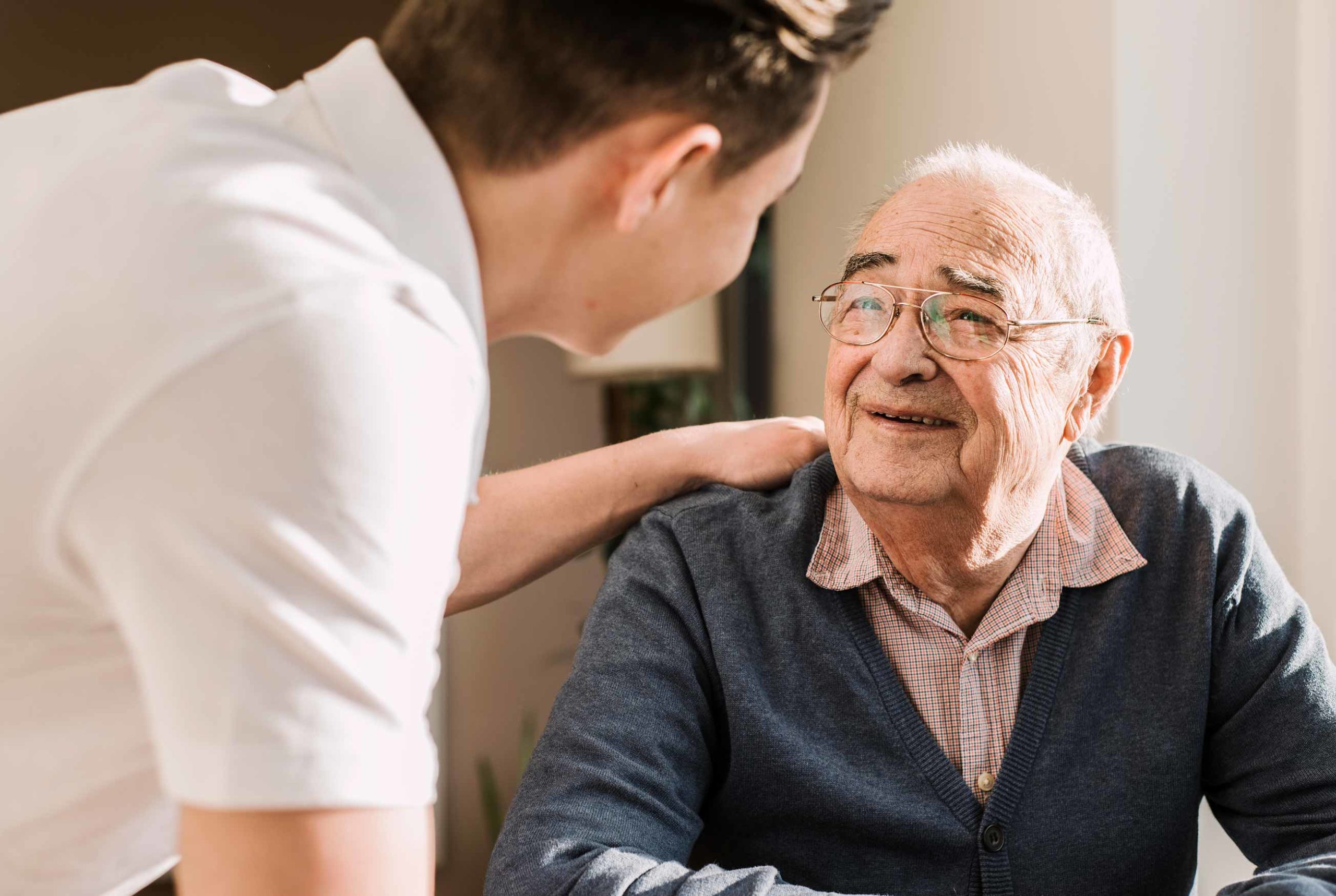 a nurse and a senior man